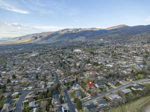 Aerial view of residential area with a mountainous background