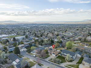 Aerial view of residential area with mountains