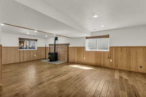 Large basement family room with pellet stove