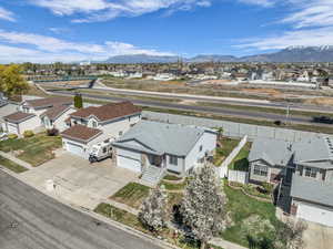 Aerial view of residential area featuring mountains