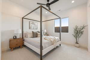 Bedroom featuring light colored carpet, recessed lighting, and ceiling fan