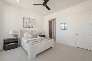 Bedroom featuring carpet floors, recessed lighting, connected bathroom, and a ceiling fan