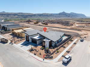 View from above of property with a mountainous background