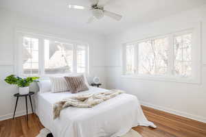 Bedroom featuring a ceiling fan and wood finished floors
