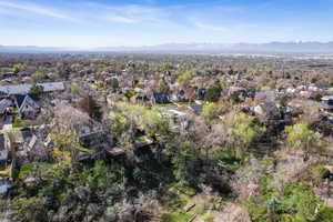 Aerial view of residential area featuring a mountain backdrop
