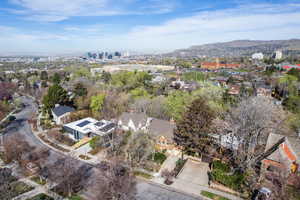 Aerial perspective of suburban area featuring a mountain backdrop