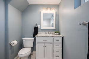 Bathroom featuring vanity and a shower