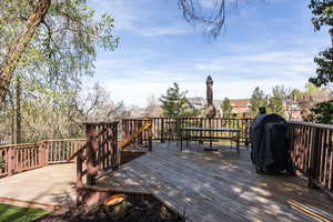 Wooden terrace with area for grilling
