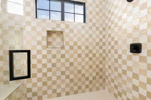 Bathroom view of tiled shower