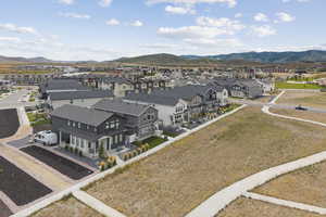 Aerial view of residential area with a mountainous background