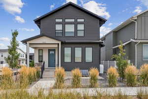 View of front of home featuring covered porch