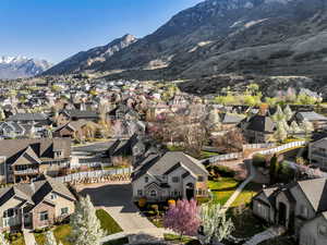 Aerial view of residential area featuring mountains