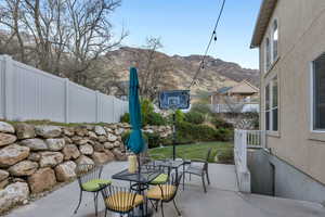 Patio space with basement stairs