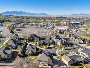 Aerial view of residential area featuring mountains