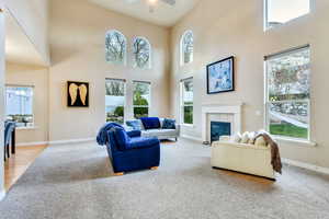 Family room has fireplace and vaulted ceiling