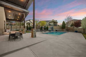 Fully Landscaped Backyard With Pool & Slide