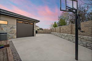 Side of home with Pull Through Garage
