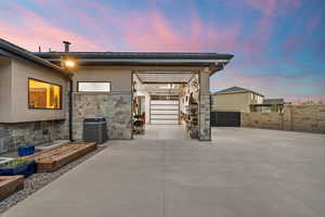 Side of home with Pull Through Garage