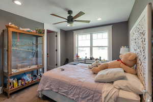 Bedroom featuring recessed lighting and ceiling fan