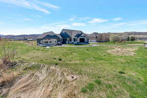 Rear view of property featuring a mountain view