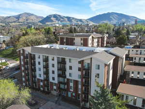 Bird's eye view of a mountainous background and apartment complex