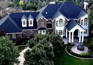 View of front of home with a front yard and a chimney