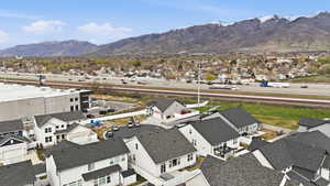 Aerial perspective of suburban area with mountains