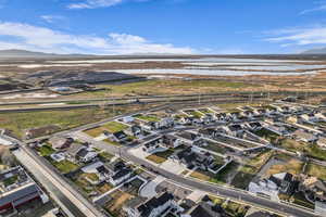 Aerial view of residential area featuring mountains
