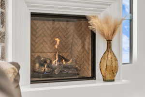 Detailed view of a warm lit fireplace