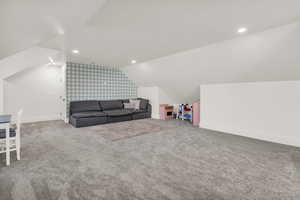 Bonus room with carpet, vaulted ceiling, and recessed lighting