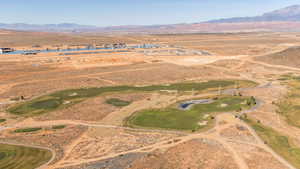 Overview of rural landscape with mountains and a local golf course