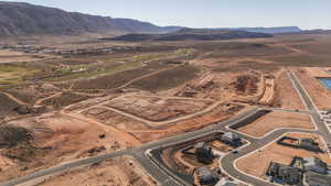 View of property location featuring a mountain backdrop and rural landscape