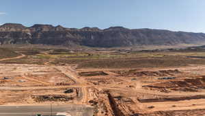 View of mountain backdrop featuring rural landscape and a desert landscape