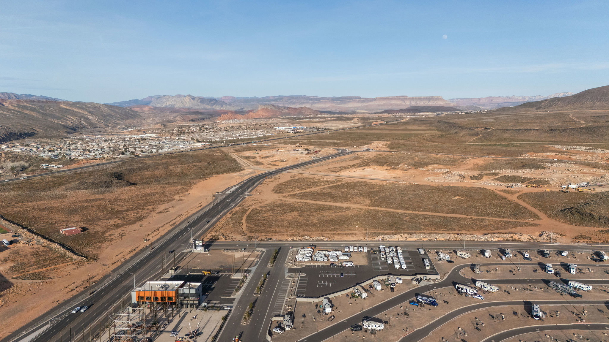 Aerial view of property and surrounding area with mountains and rural landscape