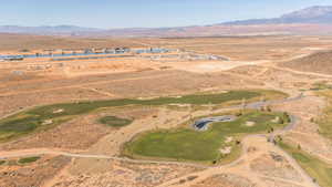 Aerial view of sparsely populated area with a desert landscape and mountains