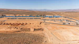 Aerial view of property and surrounding area with mountains and rural landscape