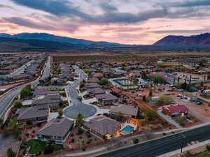 Aerial view at dusk of a mountain view and a residential view