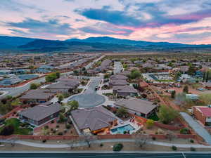 Aerial view at dusk of a mountain view and a residential view