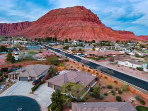 Aerial view of residential area featuring mountains