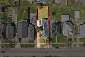 Aerial perspective of suburban area with property boundaries highlighted