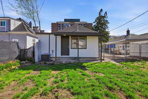 Back of property featuring a gate