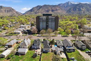 Aerial view of residential area featuring a mountainous background