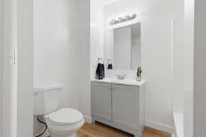 Bathroom with vanity and light wood-style flooring