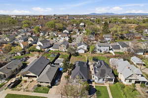 Aerial view of residential area featuring a mountain backdrop