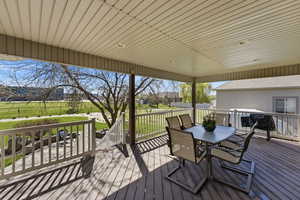 Wooden deck with outdoor dining space
