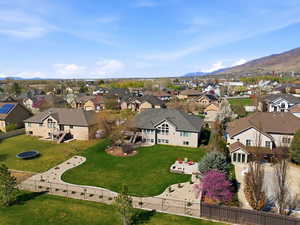 Aerial view of residential area with a mountainous background