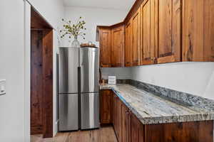 Butler pantry with walnut cabinets