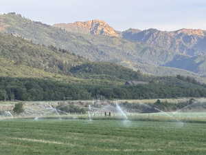 View of mountain backdrop with greenbelt landscape