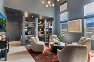 Building lobby featuring a high ceiling and a mountain view