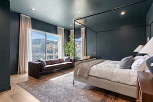 Bedroom with recessed lighting and wood-type flooring